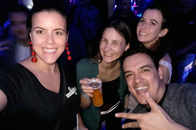 4-hour Guided Porto Pub Crawl with 6 drinks and VIP CLUBentry - Walking through Porto’s nightlife district