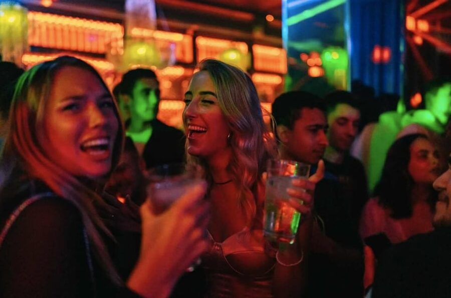 Amsterdam: King’s Day Pub Crawl with VIP Club Entry - The first bars: shots, music, and a quick way to meet people
