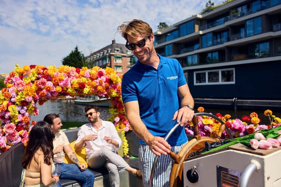 Amsterdam: The Original Flower Boat with Local Guide and Bar - Setting off from Oudezijds Voorburgwal 230