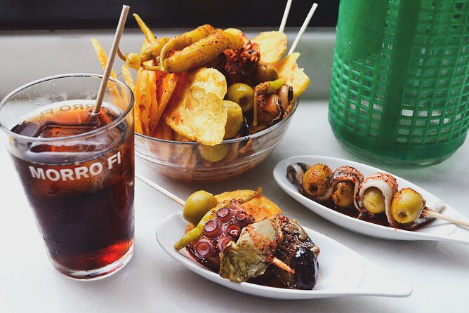 Bar Crawl in Barcelona with Spanish Wines, Vermut, Cold Beer and Tapas - Cava and Manchego at Pla de Palau
