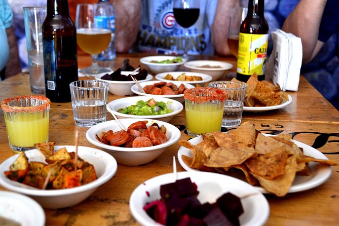 Bar Hopping Tour in Merida - Stop one: your first drink and a table of botanas