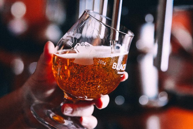 Barcelona Craft Beer Tour with a Brewery Tour and 3 Local Bars - Walking through Ciutat Vella with Kiki