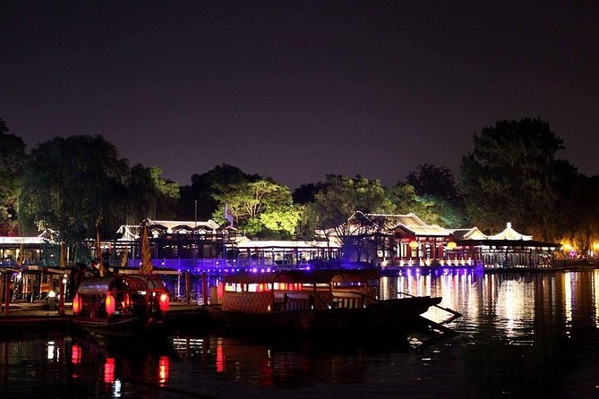 Beijing Imperial Dining Experience at Bai Jia Da Yuan Restaurant with Houhai Lake Bar Tour - Entering Bai Jia Da Yuan, a former Qing palace