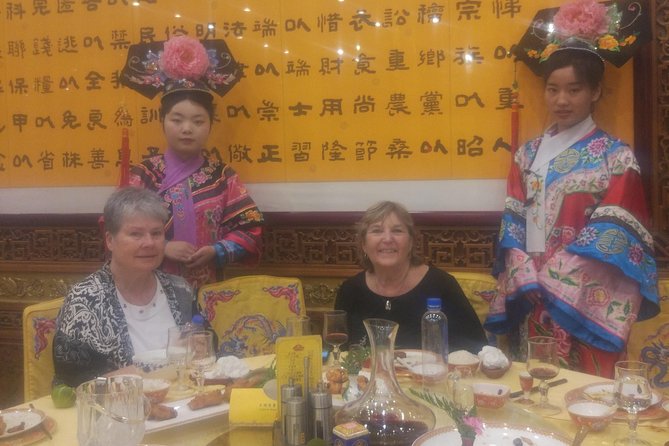 Beijing Imperial Dining Experience at Bai Jia Da Yuan Restaurant with Houhai Lake Bar Tour - Seeing Beijing’s Olympic lights from the car