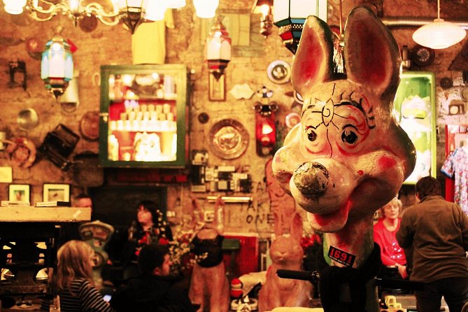 Budapest Ruin Bars Evening Walking Tour with Drinks & Snacks - A walking route through street art and changing moods