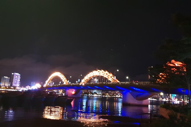 DA NANG NIGHTLIFE Tour with MARBLE MOUNTAIN & LADY BUDDHA STATUE, DRAGON BRIDGE - Dragon Bridge after dark