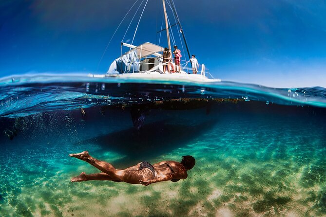 Discover Isla Mujeres: Catamaran, Snorkeling, and "Ice Bar" - From your pickup point to the Cancun marina