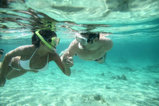 Discover Isla Mujeres: Catamaran, Snorkeling, and "Ice Bar" - Isla Mujeres free time and the beach-club lunch