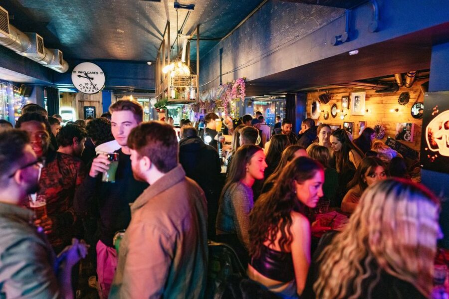 Edinburgh: 7 Bar Pub Crawl with 7 Shots & Discounts - Stop six: music, dancing, and crowded rooms