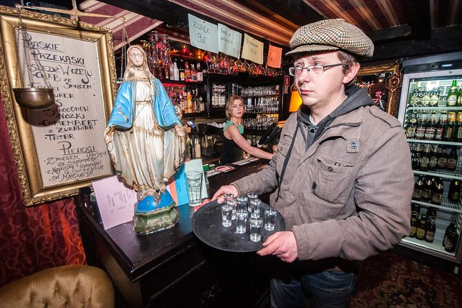 Evening Warsaw - pub and history tour with hotel pickup - Grzybowski Square sets the tone