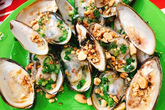 Ho Chi Minh Nightlife & Street Food Tour By Motorbike - The Ride Between the Stops