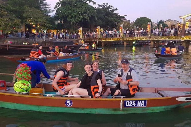 Hoi An Nightlife Tour with Hoi An Ancient Walking Tour, Boat Ride, Night Market - Walking Through Hoi An Ancient Town