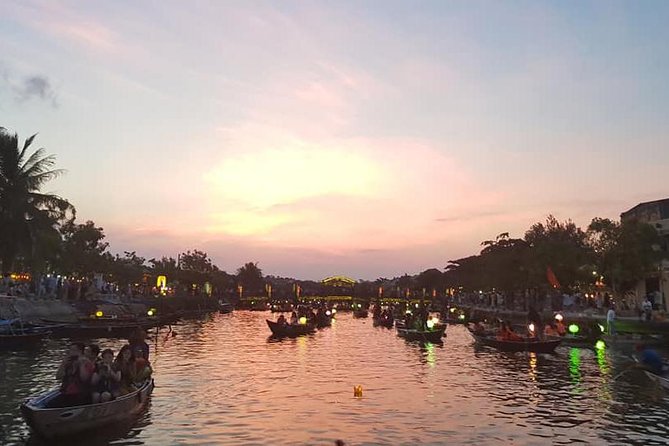 Hoi An Nightlife Tour with Hoi An Ancient Walking Tour, Boat Ride, Night Market - A Short Sampan Ride on the Hoai River