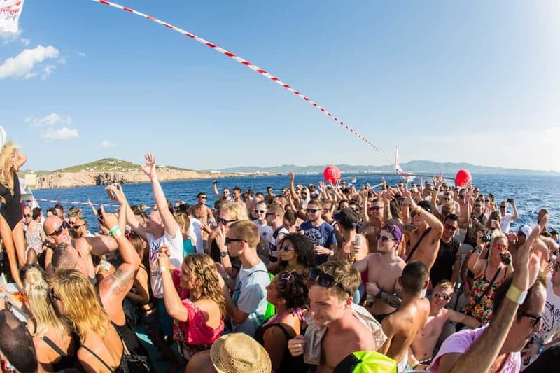 Ibiza: Sunset Boat Party Cruise with DJs with 2 Clubs - The first hour: coastline, sangria, and a changing soundtrack