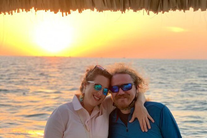 Key West: Private Sunset Cruise on an Authentic Tiki Bar Boat - What the captain adds to the evening