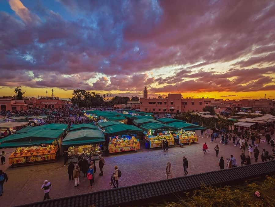 Marrakech: Souk by Night Medina Guided Walking Tour. - Moroccan tea above Jemaa el Fnaa
