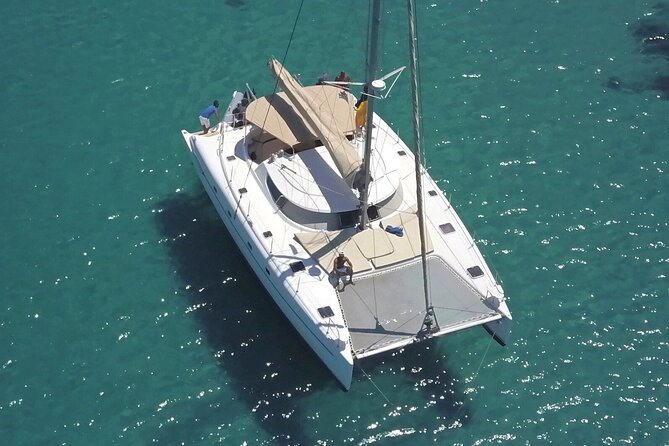 Mykonos Catamaran Private Day Cruise, Full Lunch & Open-bar - Leaving Ornos Bay on a private catamaran