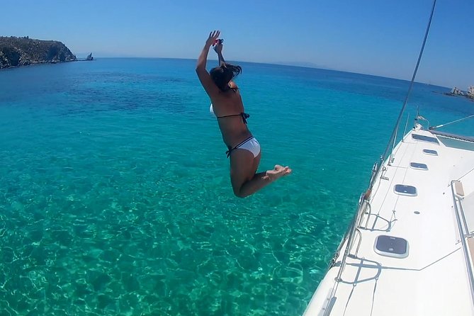 Mykonos Catamaran Private Sunset Cruise, Full Meal & Open-Bar - Rhenia’s Quiet Coves and Clear Swimming Water