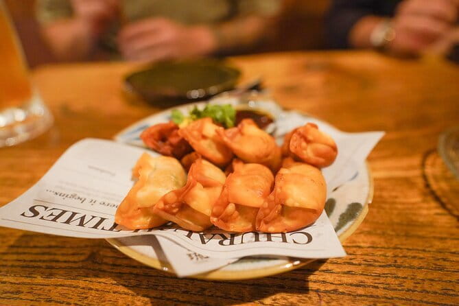 Naha Bar Hopping Tour in Okinawa - Third stop: food, Sanshin music, and a change of pace