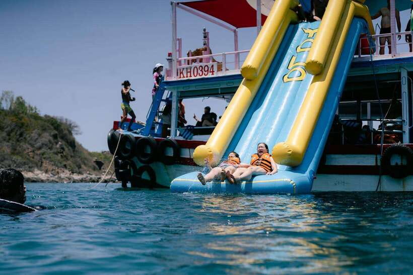 Nha Trang: Coral Reef Snorkeling, Mud Bath & Floating Bar - Con Se Tre’s floating bar and water activities