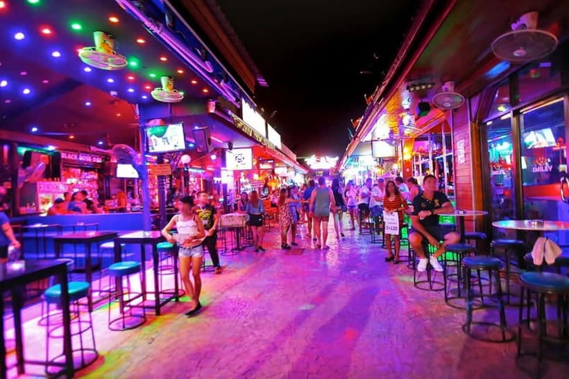 Phuket: Sunset, Beach, and Nightlife Tour with Local Food - Rawai Beach and a local drink by the water