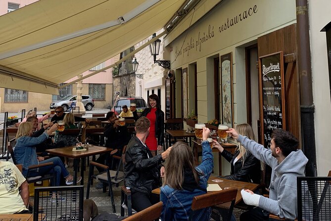 Prague Historic Pub Tour with Drinks Included - Guides, games, and the human side of the tour