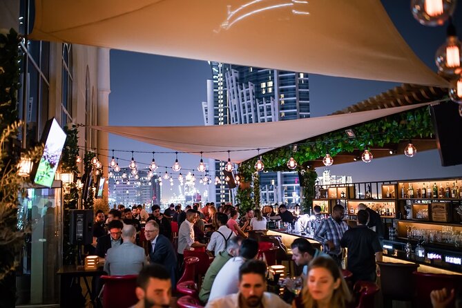 Pub Crawl Dubai: Nightlife Tours - Stop one: rooftop views in Downtown or Marina