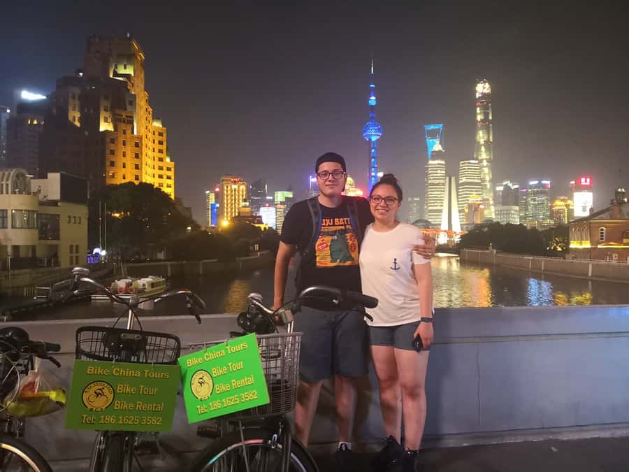 Shanghai: 4-Hour Nightlife Adventure & Tasting Bike Tour - Pudong towers and the Bund riverfront