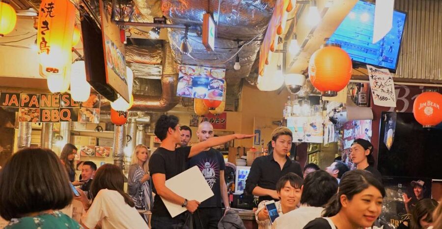 Shibuya Meltdown Night Tour: All-You-Can-Drink Bar Hopping - Walking the yokocho into working Shibuya