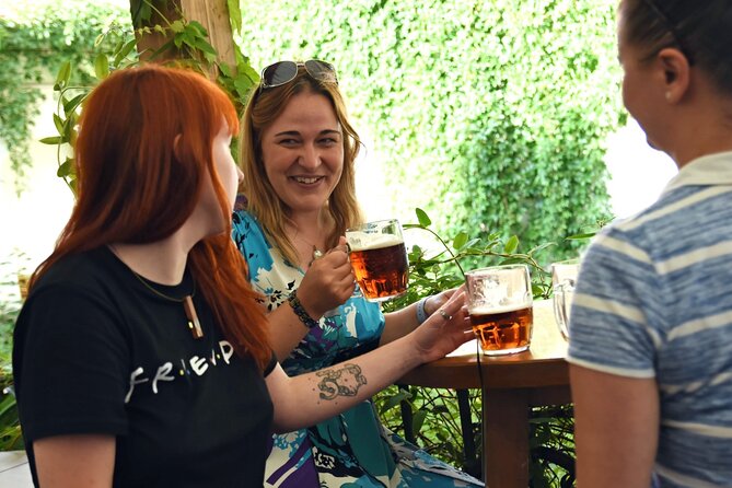 Small-Group Local Pubs Walking Tour And Traditional Czech Dinner - Walking through Old Town after dark