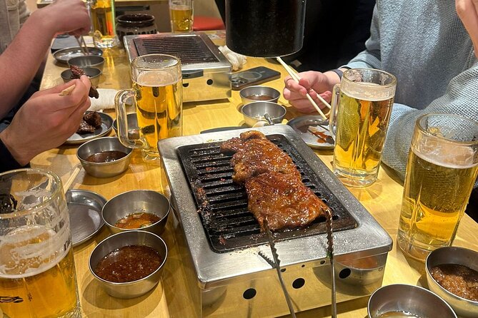 Tokyo: Shinjuku Bar Hopping & Night Walking Tour - Kabukicho: neon, entertainment, and a change of mood