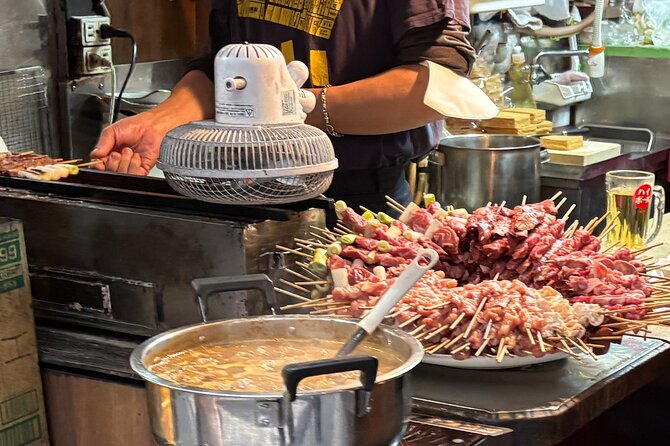 Tokyo: Shinjuku Bar Hopping & Night Walking Tour - Golden Gai: tiny bars and the final stop