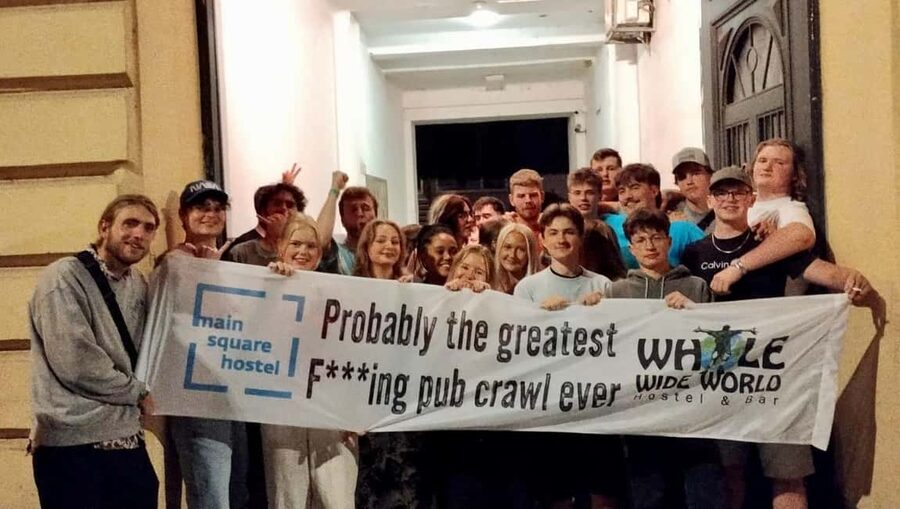 Zagreb: Pub Crawl, 1-Hour of Unlimited Drinks, & Club Entry - Walking from the hostel to two bars